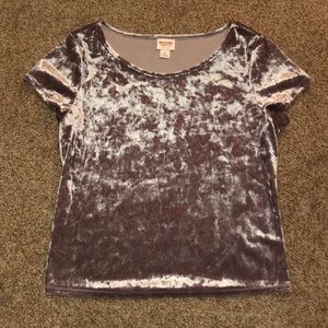 Light purple velvet top.